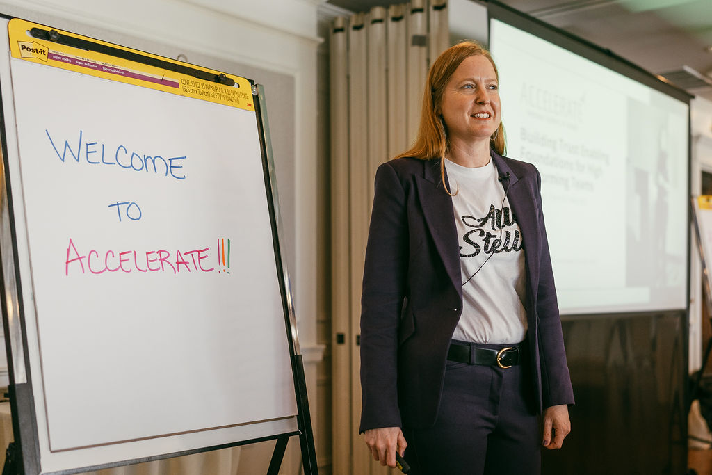 Facilitator welcoming participants to an Accelerate leadership workshop